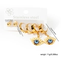 Three-piece golden stainless steel earring set with blue evil eye charms and round hoops - Stainless Steel Eyelash Eye Set A