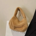 Chic camel-colored faux fur plush handbag hanging on a white wall hook - Solid Brown // Great Deal