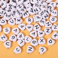 Heart-shaped white acrylic alphabet beads with black letters for DIY jewelry making - 5*10mm Outer Heart-shaped White And Black Lettering (100 Pieces)