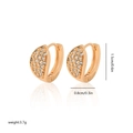 Gold-plated C-shaped hoop earrings with sparkling cubic zirconia inlays on white background - EH074 Crescent Micro Pave