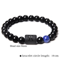 Pisces zodiac beaded bracelet with 8mm black stones and a natural blue lapis bead - Pisces