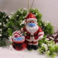 Adorno de Papá Noel de resina con mascarilla médica y bolsa de regalos con suministros - Colgante