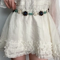 Ethnic beaded waist chain with turquoise and wood flower on a pleated white dress - Ethnic Woven K0261