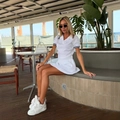 White knit two-piece set with polo top and pleated skirt in preppy tennis style - S / White