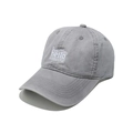 Close-up of white Hello embroidery on a grey washed cotton baseball cap with curved brim - M (56-58cm) / Gray