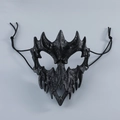 Close-up of black gothic half-face mask with bone textures and sharp fangs - Dragon God Black