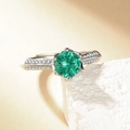 Elegant silver ring with a faceted green center stone on a white textured stone base - 1 Carat [white Gold] Ljz-256 / Adjustable Open