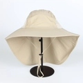 Detail of outdoor sun hat featuring wide brim, neck protection flap, and breathable mesh - Adjustable / Beige