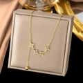Minimalist 18K gold plated titanium necklace featuring star charms and a spherical pendant - Star Tassel Ball (AH6134) / Gold