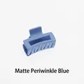 Macro view of a 4cm matte purplish blue square hair claw clip with cross-teeth design - Matte Purplish Blue