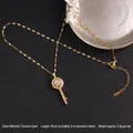 Gold plated titanium steel spinning key necklace with micro paved cubic zirconia - Floral Round Head Key Rotating Style (A842)