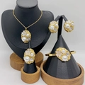 Golden luxury jewelry set featuring pearl flower necklace, bracelet, earrings and ring - White Flowers (KS228693-LX)