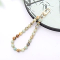 Close-up of handmade beaded phone strap with agate natural stones and golden lobster clasp - K3411 Amazonite Natural Stone Pendant