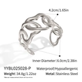Macro detail showing stainless steel silver heart-shaped chain bracelet with size dimensions - Silver