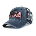Macro detail of USA embroidery with flag pattern and distressed brim on washed baseball cap - Navy USA