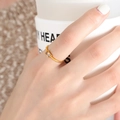 Slim gold titanium steel ring featuring a baguette cut clear zircon on a delicate band - Gold White Zirconia