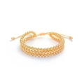 Drielagige gouden kralenarmband met hartgeweven koord en verstelbare sluiting - Drielaagse gouden kraal geweven armband