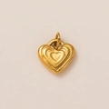 Golden 18K vacuum plated stainless steel heart pendant with layered concentric design - Gold Heart Ripple Pendant