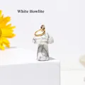 Mini mushroom pendant carved from natural white howlite with a golden metal loop - Howlite