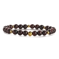 Macro shot of 6mm garnet beads and gold metal spacers on a stretch beaded bracelet - 6MM Garnet