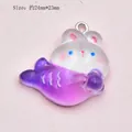 Detail view of a 24mm purple gradient resin rabbit fish charm with metal ring - No.4 Purple Rabbit Fish