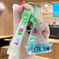 Green floating sea horse sailboat keychain with liquid glitter and happy strap - Ocean Creature - Axolotl