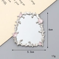 Detailed view of silver Y2K irregular liquid metal heart mirror with pink crystal accents - D2785 Square Gemstone Mirror / Silver