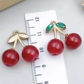 DIY red cherry pendant in alloy and acrylic with green leaves and gold finish charm - Resin Green Stone Cherry (23418)
