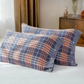Soft cotton gauze pillowcase featuring grey and orange plaid pattern with button detail - Brown Plaid