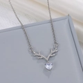 Silver reindeer necklace featuring a heart-shaped zircon and pearl antler accents - Thick White K-408