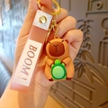 Cute Capybara keychain with green turtle, pink wrist strap, and golden clip accessory - Capybara - Turtle Style