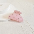 Detailed close-up of a pink rhinestone claw clip on a clean geometric background - Pink Small