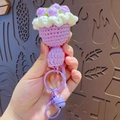 Handmade crochet bouquet keychain featuring purple and white mini flowers with bell - Purple Rose