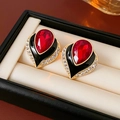 Detail of vintage heart earrings with red gemstone, black enamel and crystal border - 925 Sterling Silver Pin Gold Red Black Colorway (HE22136)
