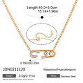 Gold plated stainless steel necklace featuring safety pin pendant with pavé crystal accents - Gold Safety Pin Element Necklace (JDN0211128)