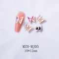 Detailed macro view of 3D aurora crystal butterfly nail charms with 10x12mm dimensions - MJ05 Mocha White