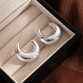 Chunky silver bean stud earrings with high-polished C-shape design on beige velvet - Silver Thick C-Shape