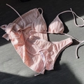 Three-piece light pink seersucker bikini set with ruffled sarong and drawstring detail - Flesh Pink