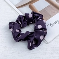 Dark purple satin scrunchie with large pink polka dots in a stylish aesthetic design - Deep purple
