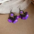 Detail of bohemian fish-shaped shell tassel earrings with purple sequins and bronze hooks - Ear Hook Purple Sequin Tassel