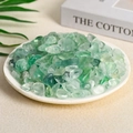 Natural green fluorite raw crystal stones displayed on a minimalist white ceramic plate - Green Fluorite (9-12mm) 100g
