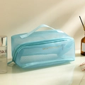 Blue mesh travel cosmetic bag with gold lettering and top handle for toiletries - Lake Blue