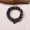 Detail of colorful faceted crystal beads bracelet with engraved gold metal charm - Deep Multicolor