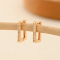 Detailed close-up of rectangular gold earrings with double rows of pavé cubic zirconia - EH227 Rectangular Double Row