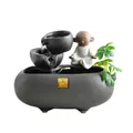 Zen style ceramic desktop fountain with monk statue and artificial greenery decoration - Carefree Black [Lucky Wealth]