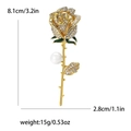 Broche de rosa dorada vintage con brillantes pedrería, hojas verdes y perla blanca - Dorado