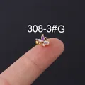 Golden butterfly ear stud with purple and iridescent zircon stones held on a fingertip - Butterfly Aurora Gemstone Style (HSPJ308-3#G) / Gold