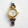 Women's quartz bracelet watch in stylish two-tone gold and silver finish with crystal accents - Two-tone Gold Silver Simple Analog Round