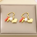 Detail of heart hoop earrings with orange beads, white pearls and gold pendants - Red Bead Heart Combination Pendant Earrings (KE118723-SP)
