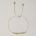 Bracciale intrecciato a mano con perline sfaccettate verde chiaro e cordino regolabile - Agosto-Peridoto